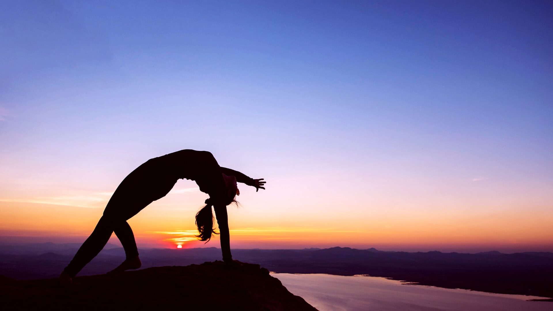 Yoga silhouette at sunset