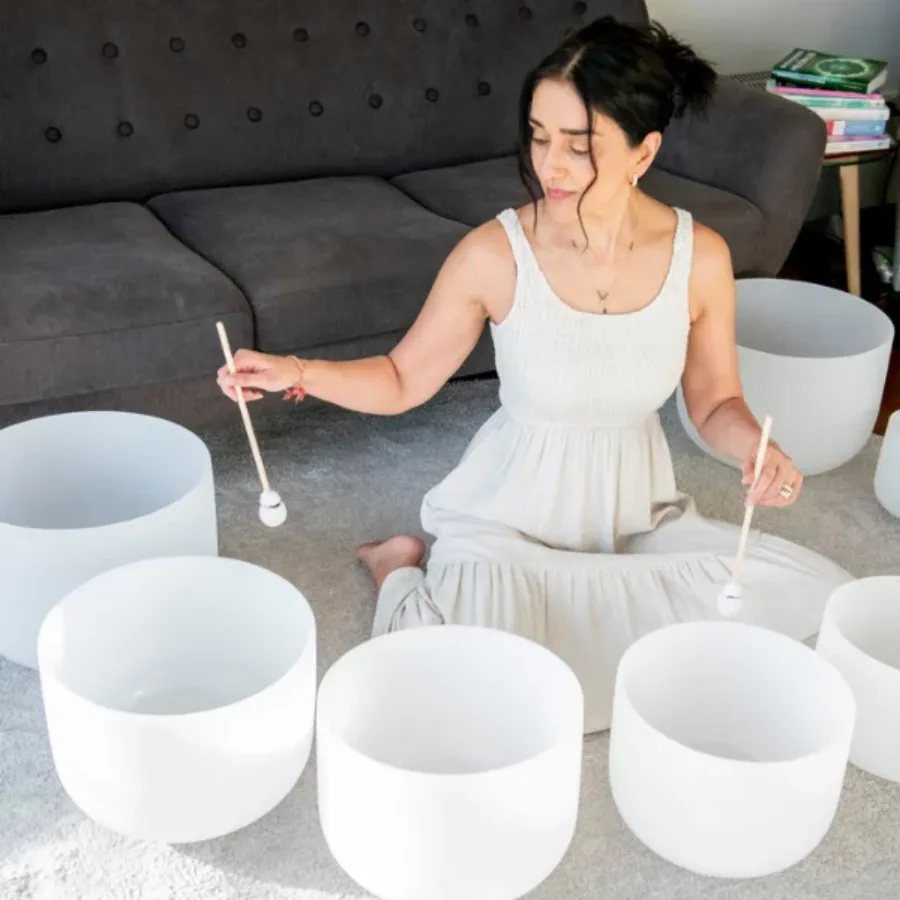 Shavita playing singing bowls