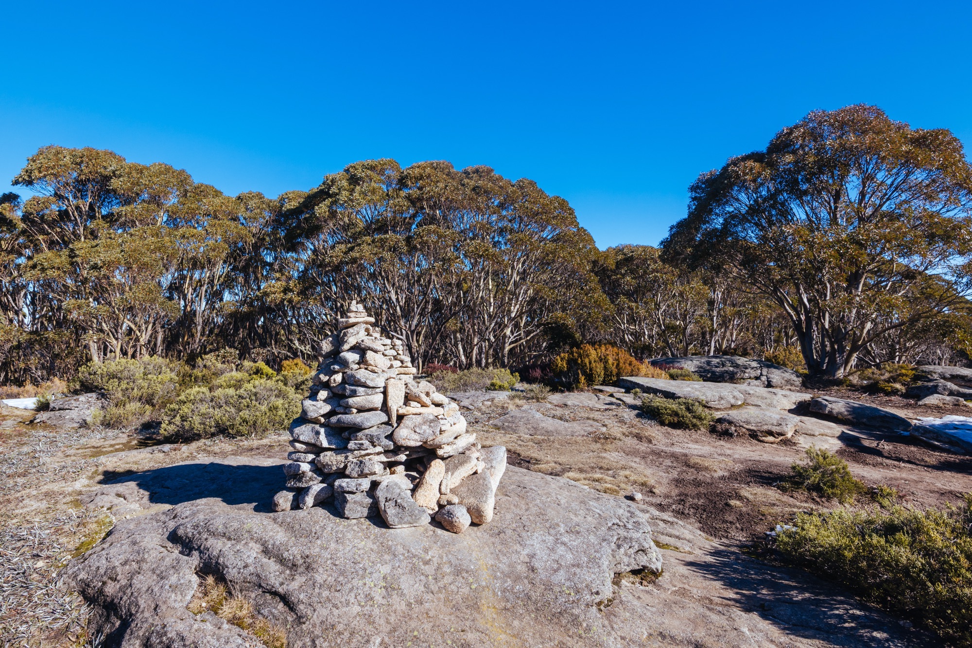 A stone cairn among the snow gums at Mt St Gwinear, Victoria